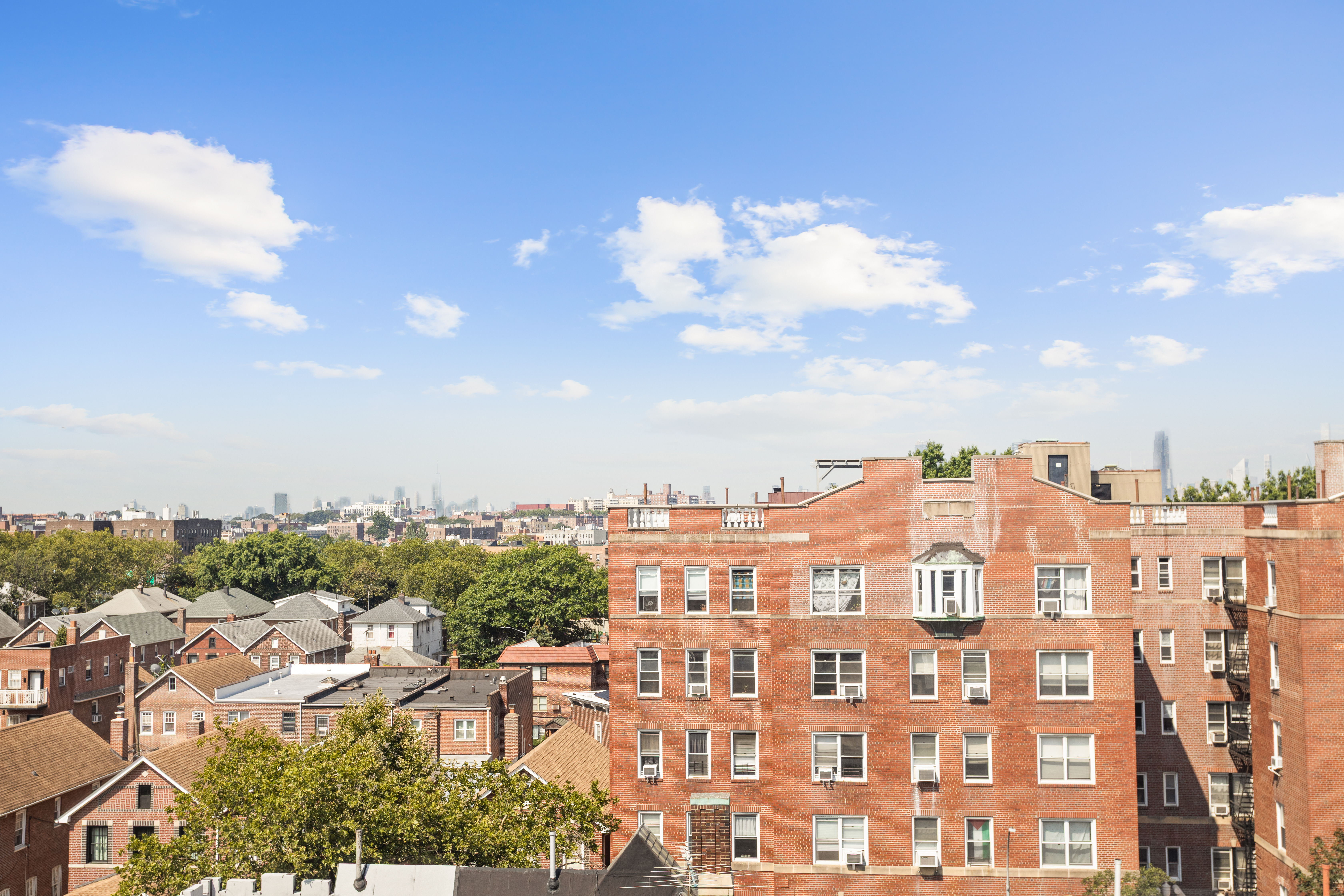 35-30 73rd Street Queens, NY 11372 - Photo 7 of 11 a view of a city with tall buildings