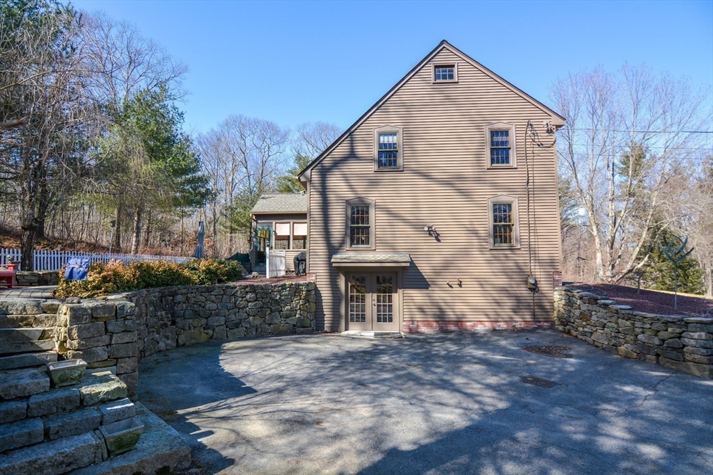 187 Blackstone Street Mendon, MA 01756 - Photo 5 of 42 a view of a house with a yard