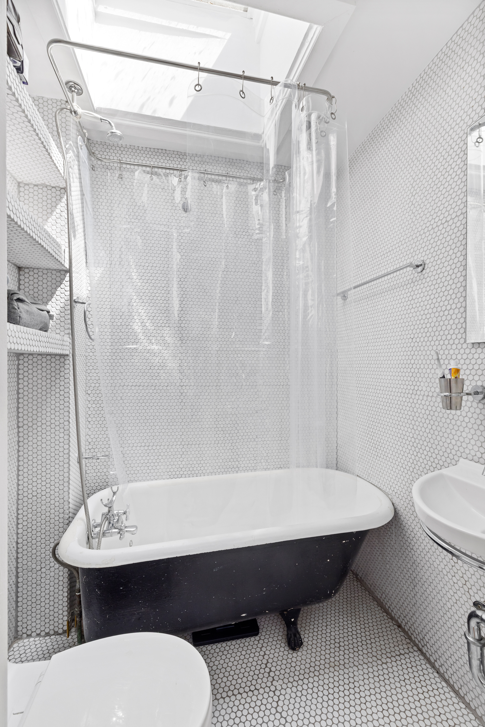 437 Warren Street Brooklyn, NY 11217 - Photo 12 of 17 a bathroom with a sink toilet and shower