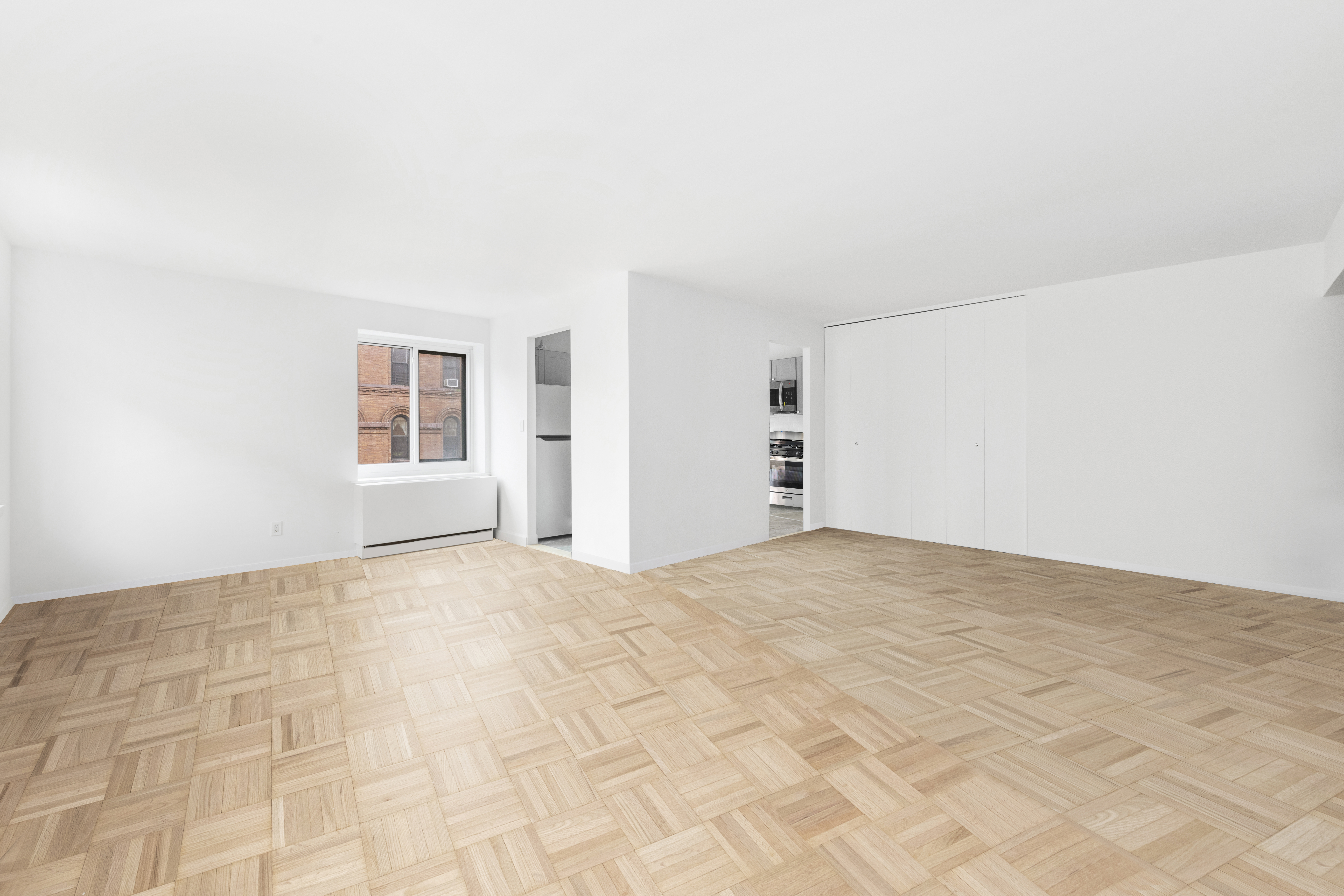 100 West 89th Street, Unit 3E Manhattan, NY 10024 - Photo 5 of 19 a view of empty room with windows