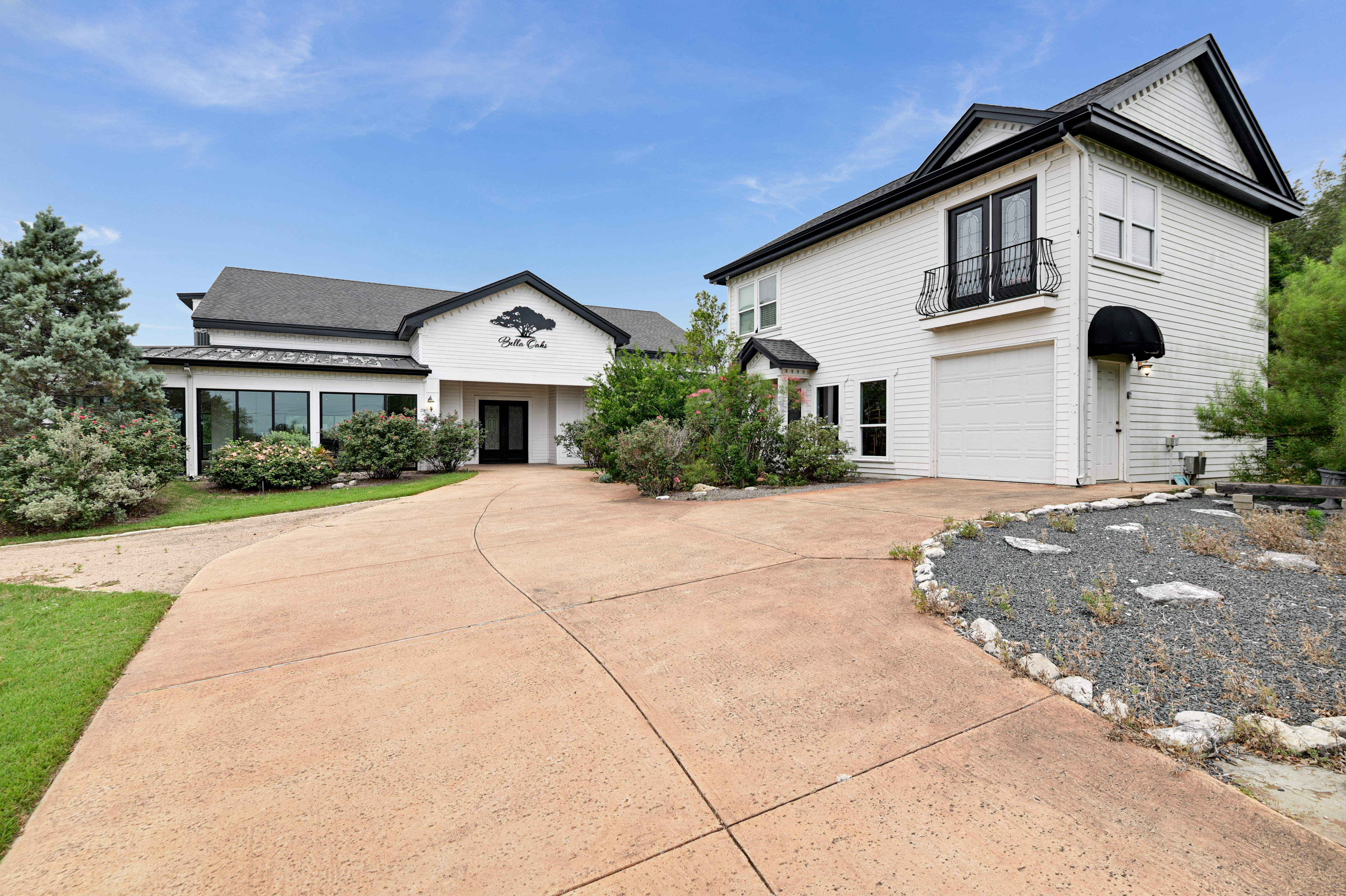 14913 Murfin Road Austin, TX 78734 - Photo 34 of 40 a front view of a house with a yard and garage
