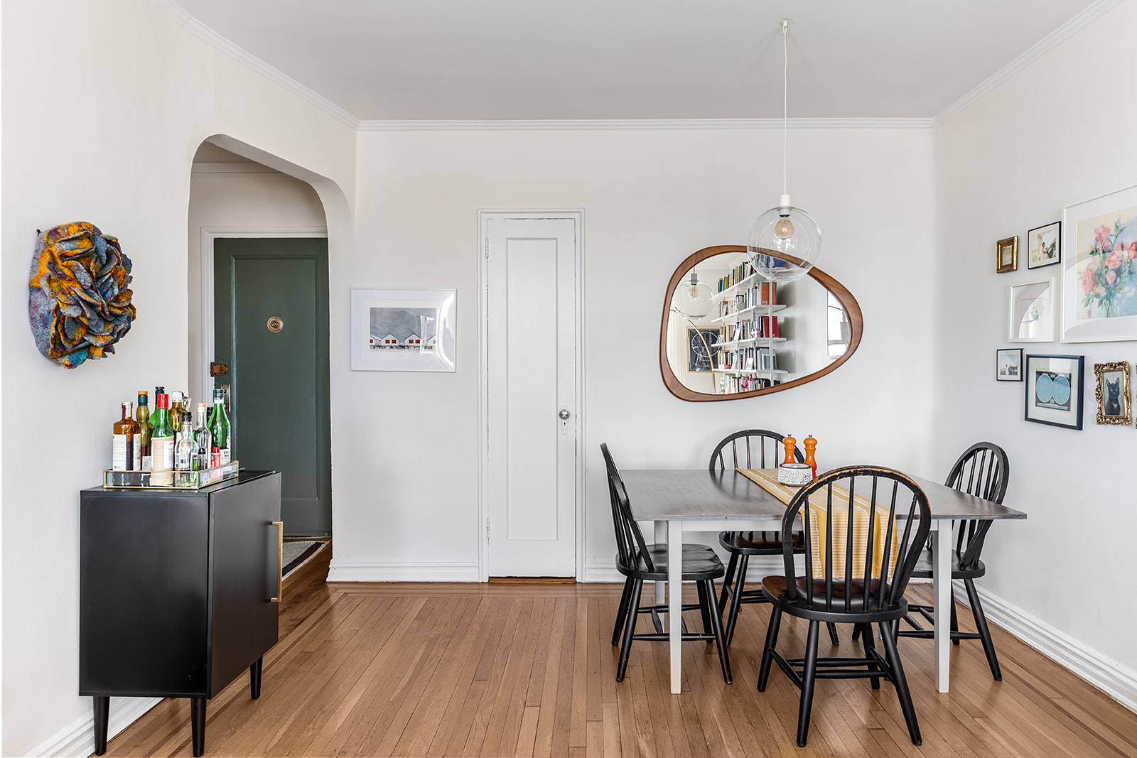 140 East 2nd Street, Unit 5B Brooklyn, NY 11218 - Photo 1 of 7 a view of a dining room with furniture and wooden floor