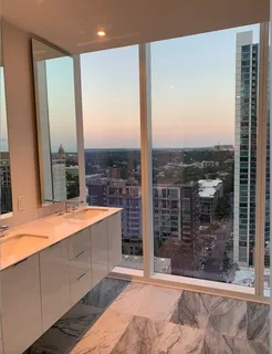 a large window with a view of living room