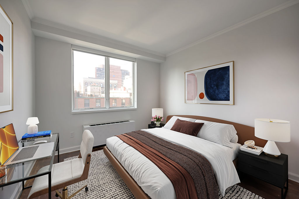 32 West 128th Street, Unit 4 Manhattan, NY 10027 - Photo 8 of 12 a bedroom with a bed and wooden floor