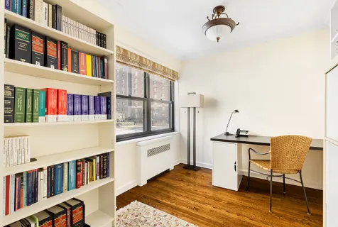 a view of a living room and a window