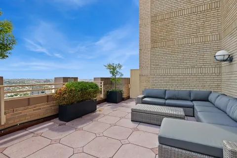 a view of a terrace with couches