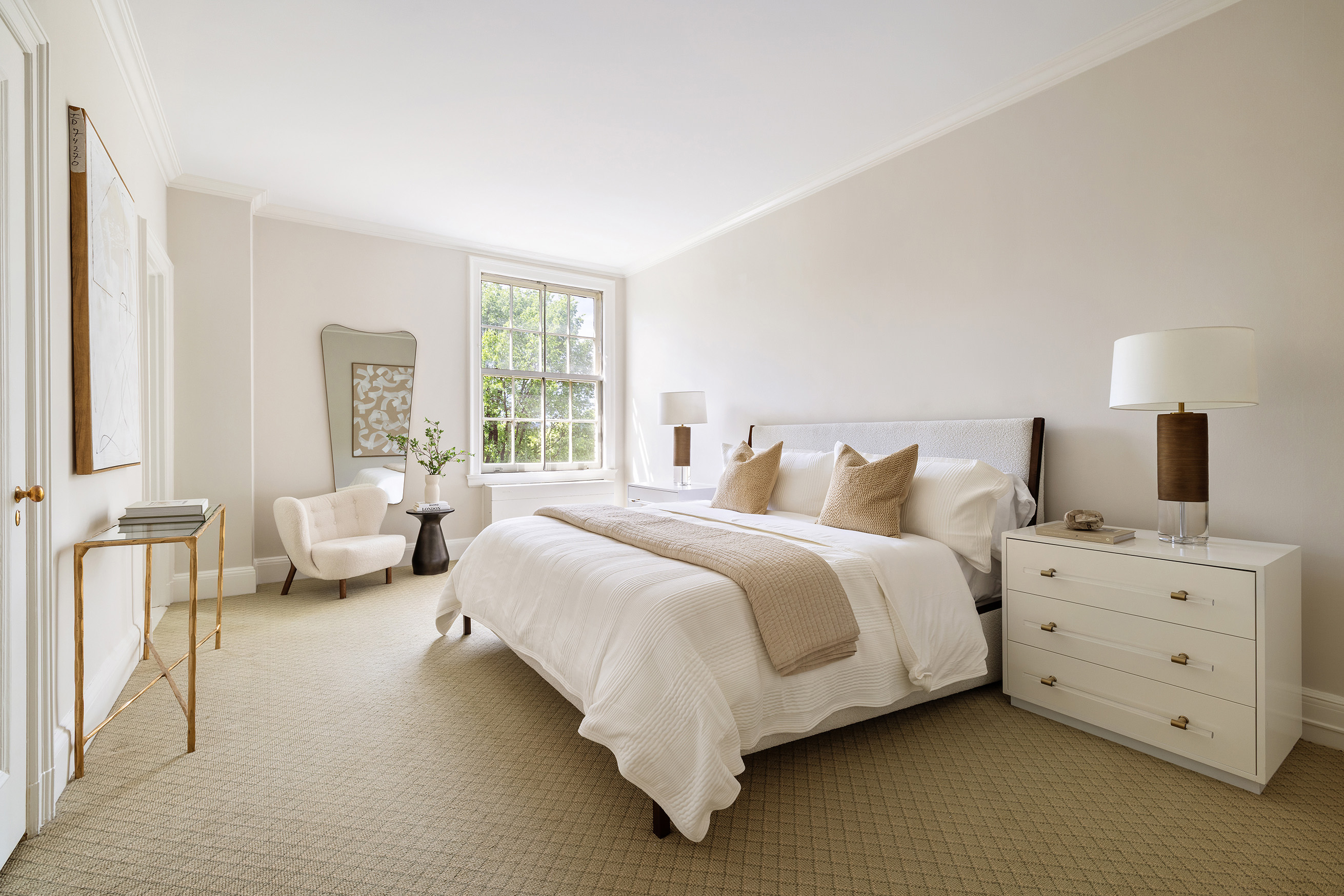 1120 5th Avenue, Unit 7B Manhattan, NY 10128 - Photo 9 of 17 a bedroom with bed and window