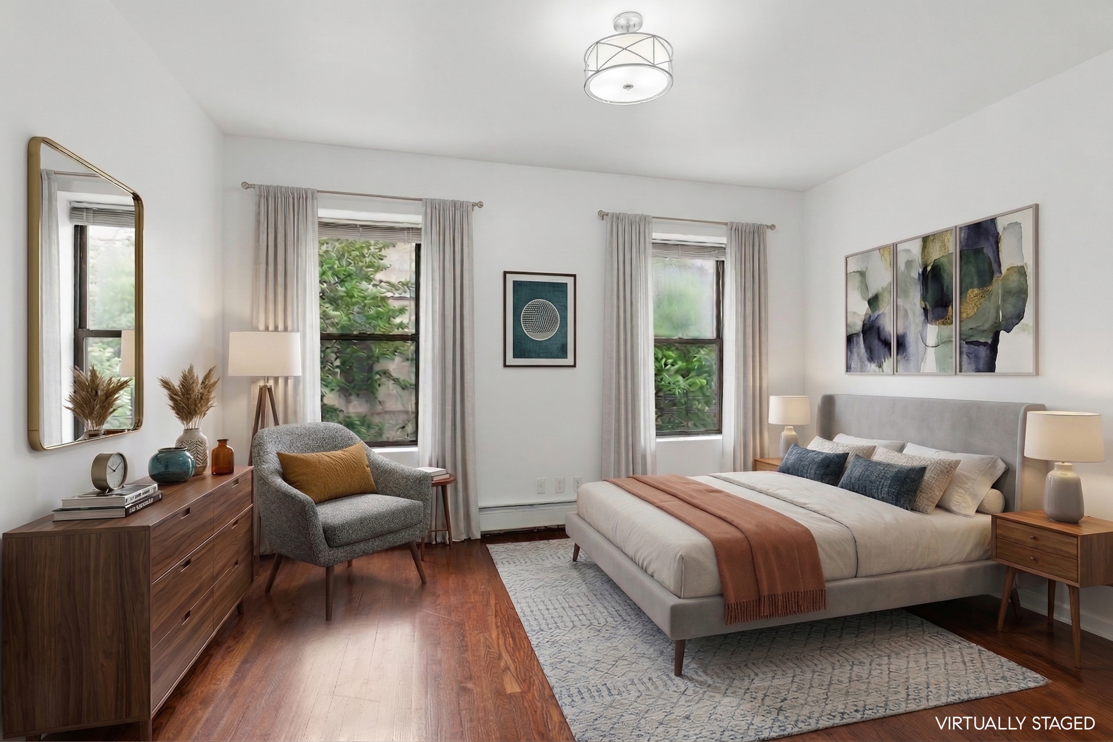 165 West 126th Street Manhattan, NY 10027 - Photo 32 of 40 a bedroom with a bed and wooden floor