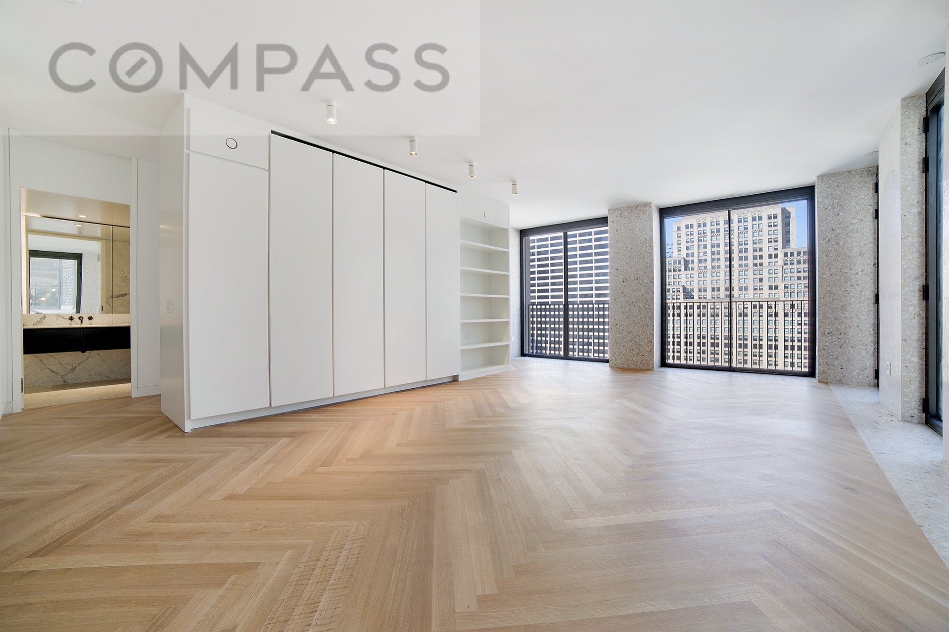 16 West 40th Street, Unit 21B Manhattan, NY 10018 - Photo 8 of 18 a view of an empty room with a window