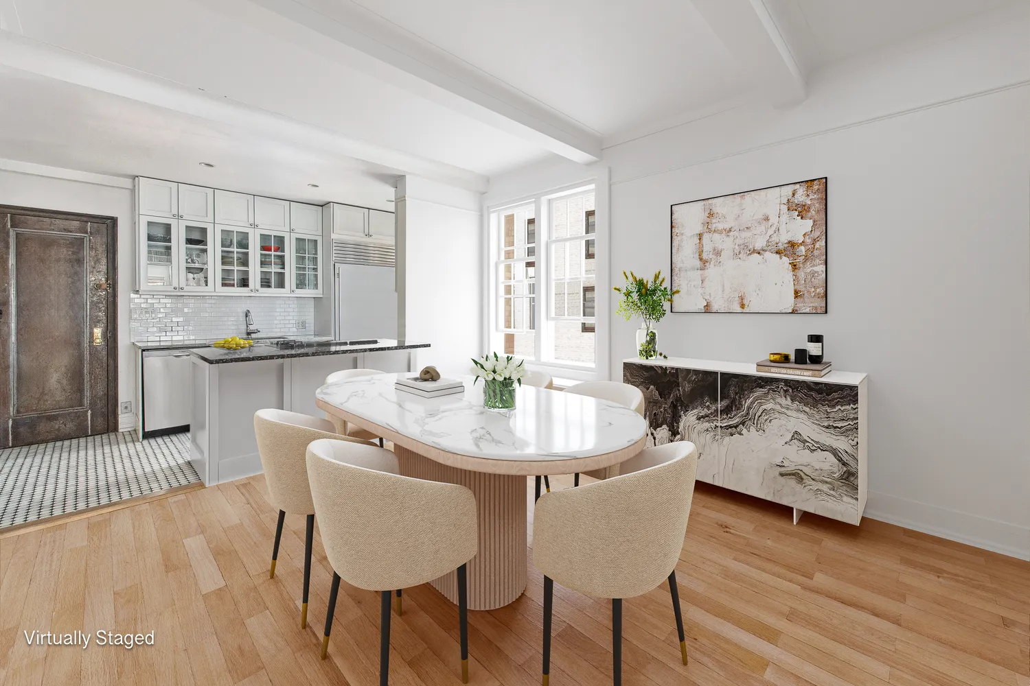 a dining room with furniture and wooden floor