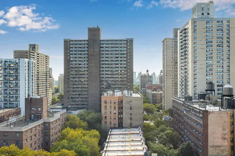 a city view with tall buildings