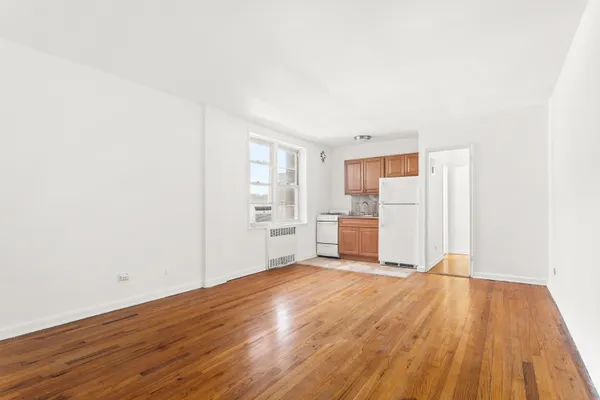 a view of a livingroom with wooden floor