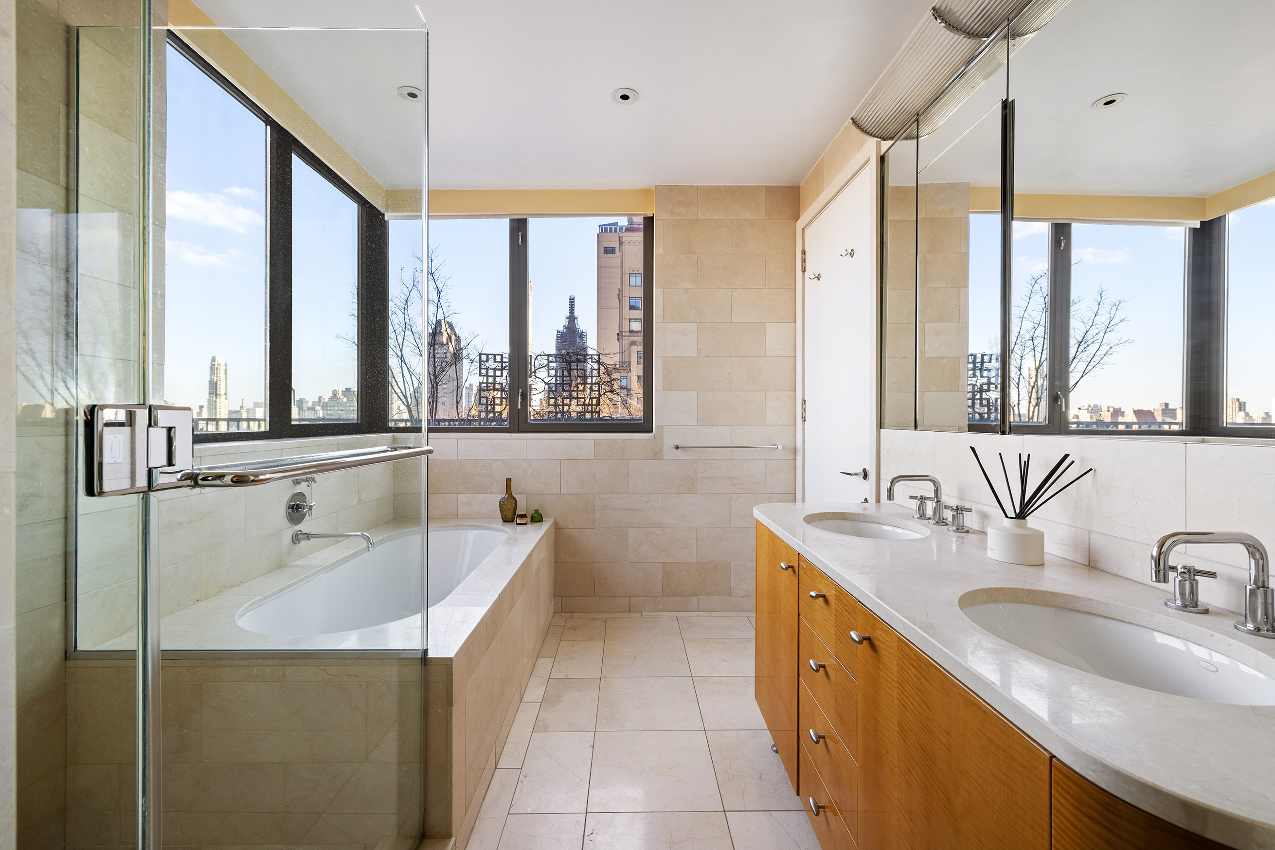 110 Central Park South, Unit PH1 Manhattan, NY 10019 - Photo 18 of 26 a bathroom with a granite countertop sink and a large mirror
