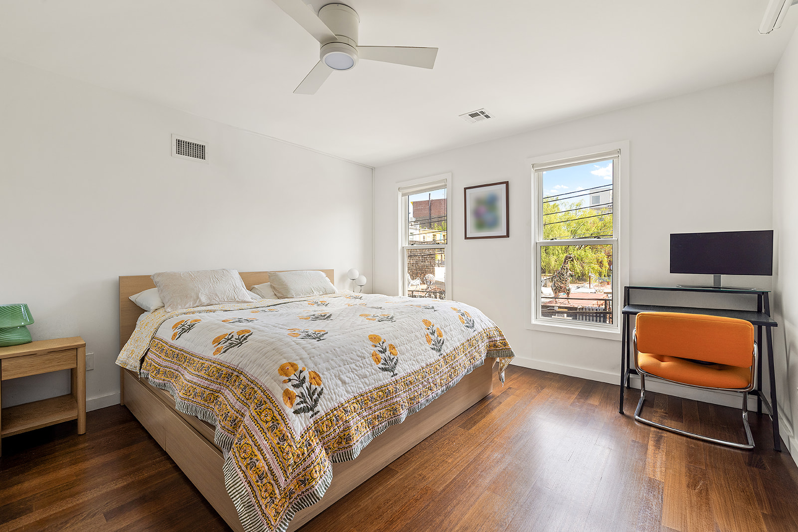 95 Dikeman Street, Unit 2 Brooklyn, NY 11231 - Photo 6 of 11 a bedroom with a bed and flat screen tv