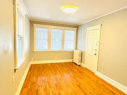 a view of an empty room with a window