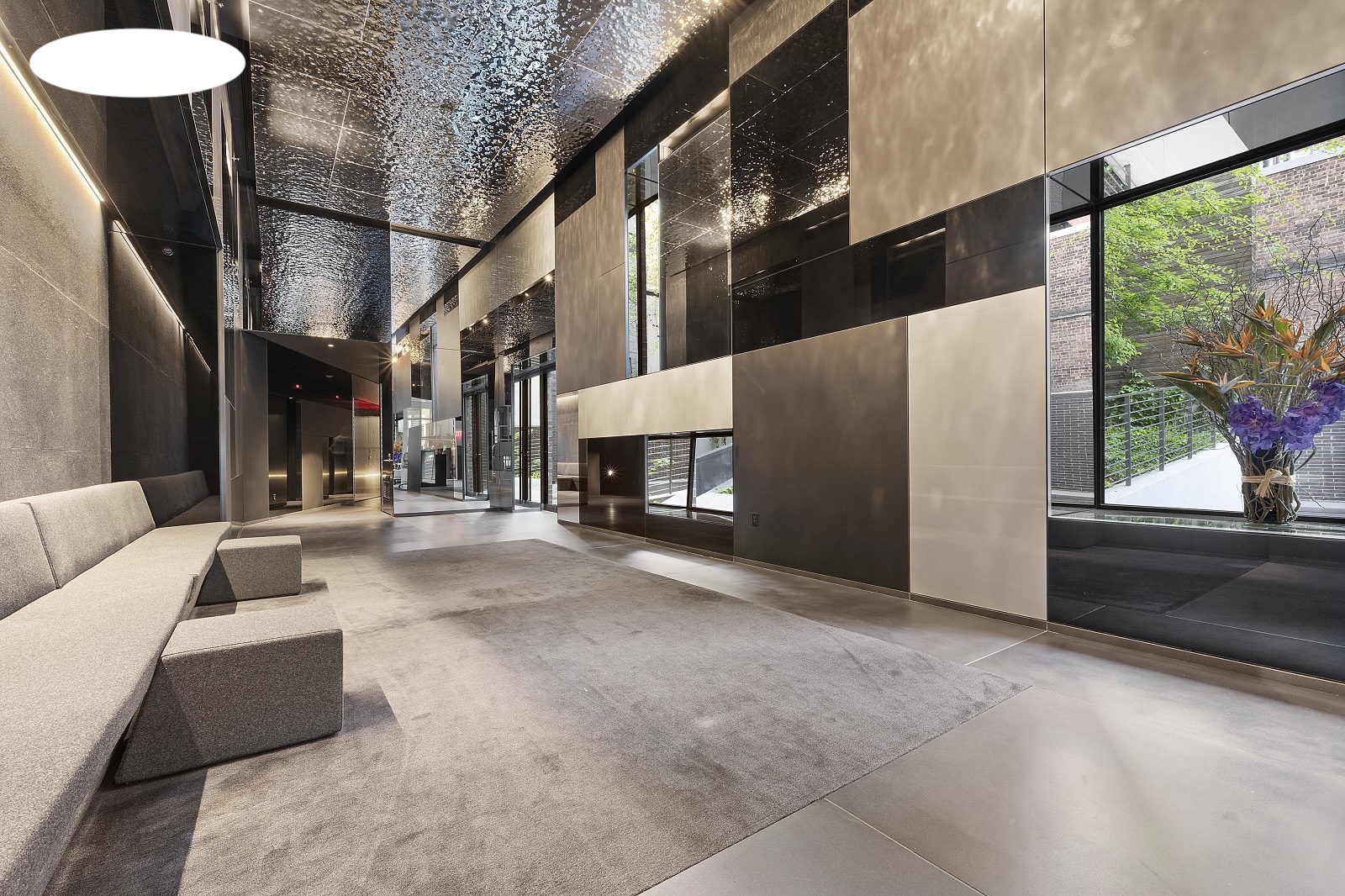 100 11th Avenue, Unit 9D Manhattan, NY 10011 - Photo 14 of 17 a living room with furniture and a couch