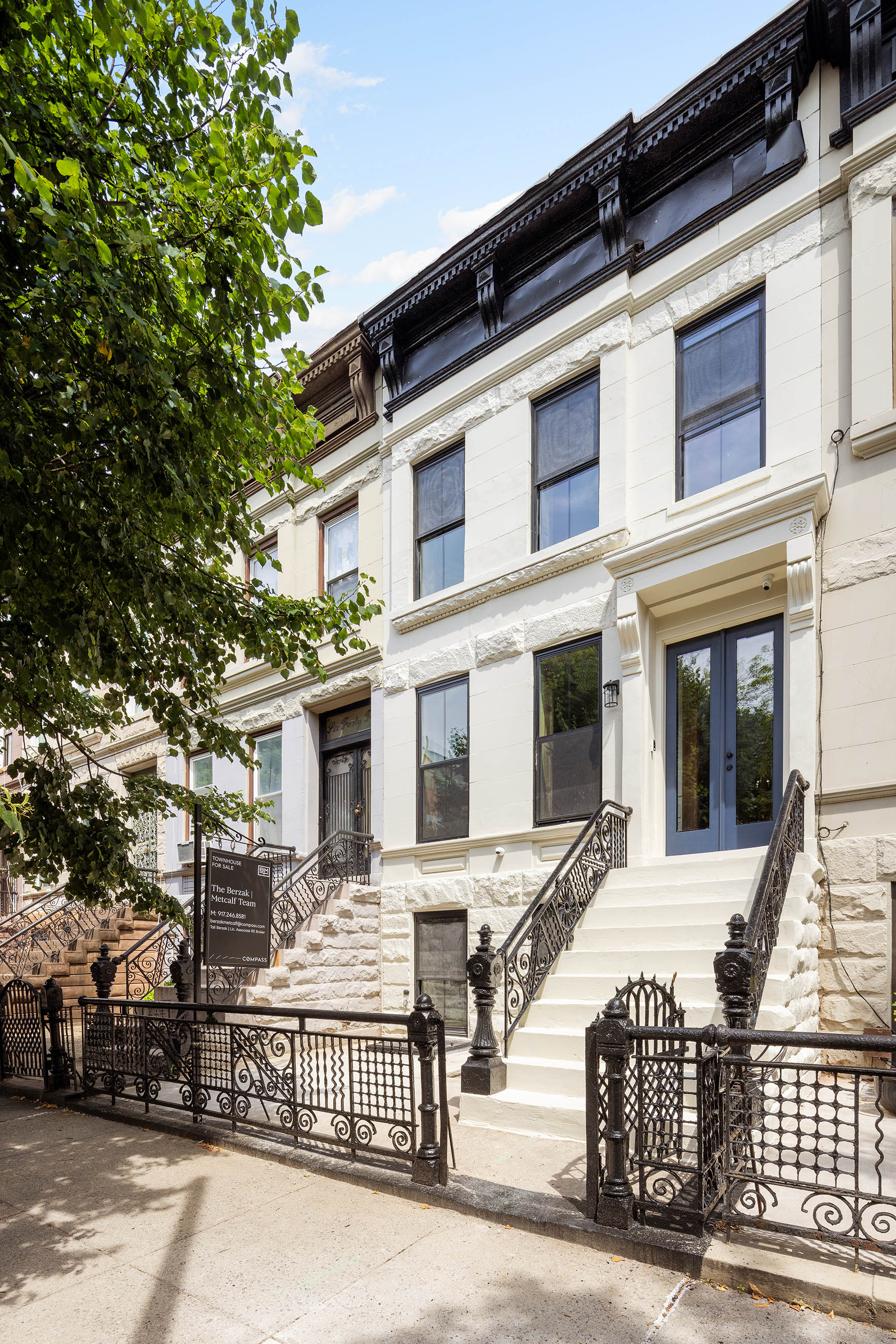 647 Macon Street Brooklyn, NY 11233 - Photo 18 of 20 a view of a building with a large tree