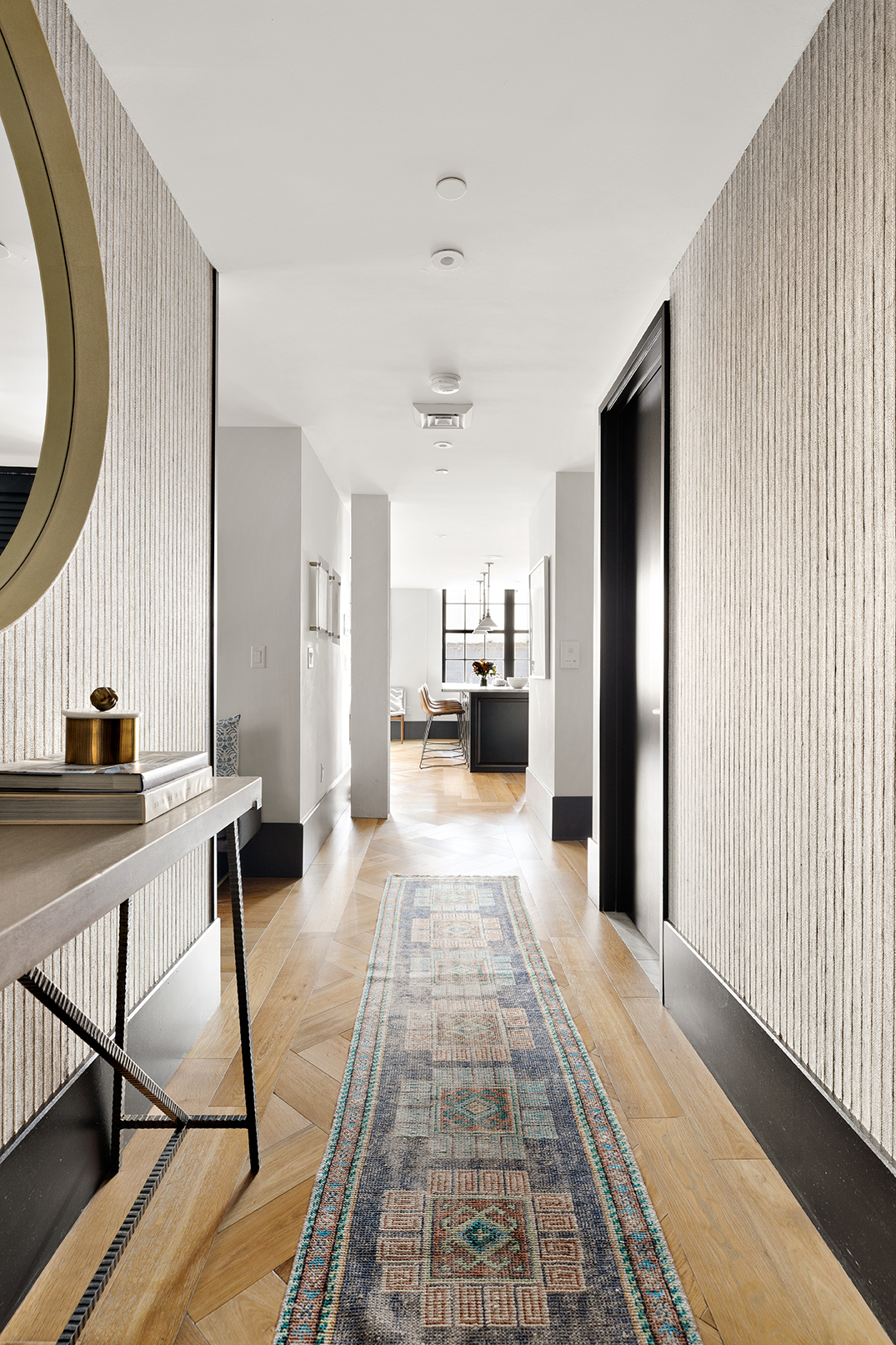 51 Jay Street, Unit 3C Brooklyn, NY 11201 - Photo 4 of 10 a view of a hallway with a livingroom and furniture