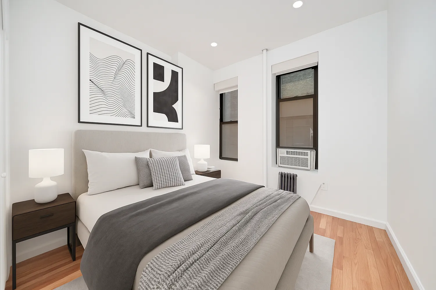 a bedroom with a bed and a painting on the wall