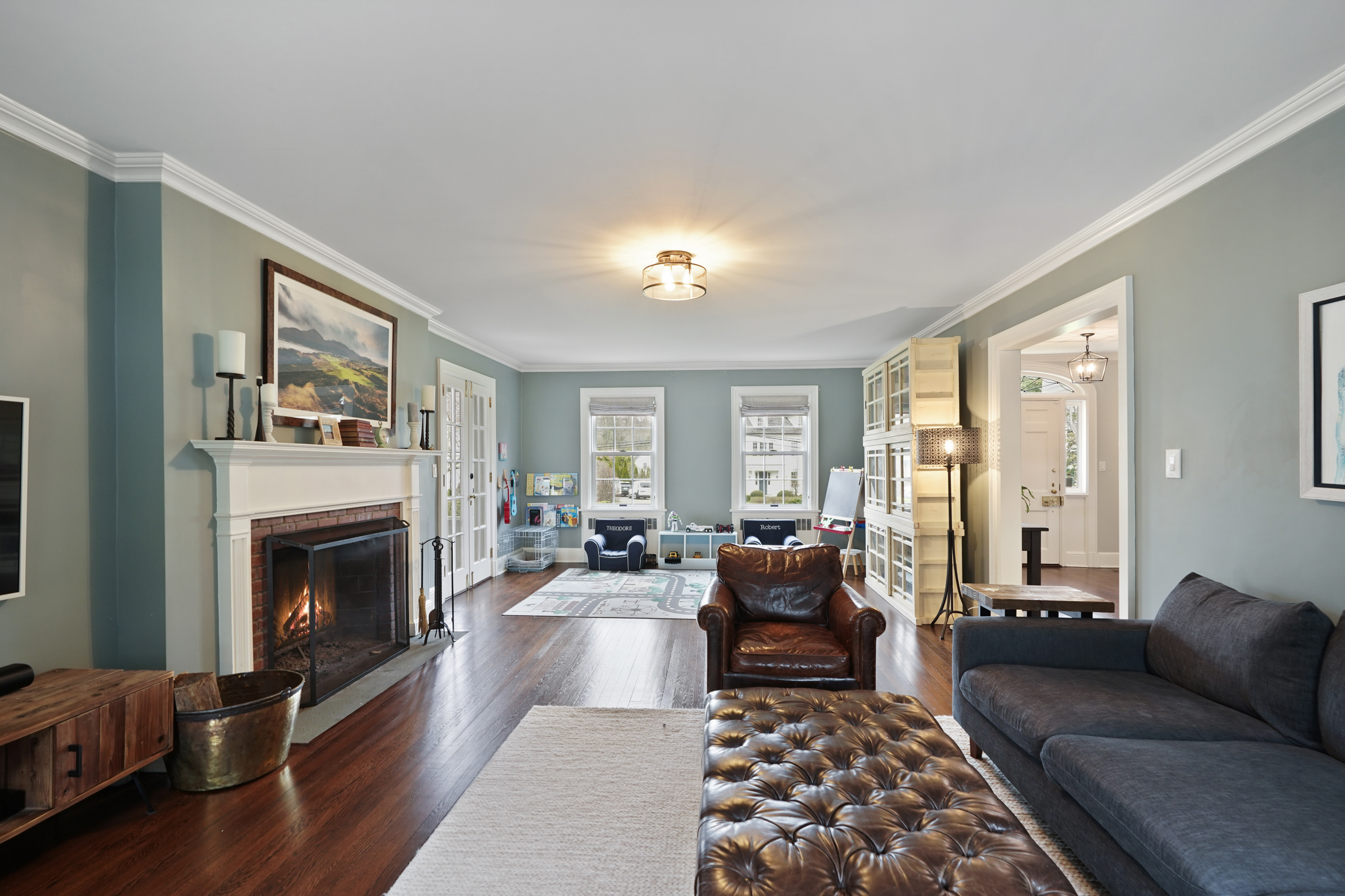 15 Anderson Road Greenwich, CT 06830 - Photo 4 of 30 a living room with furniture and a fireplace