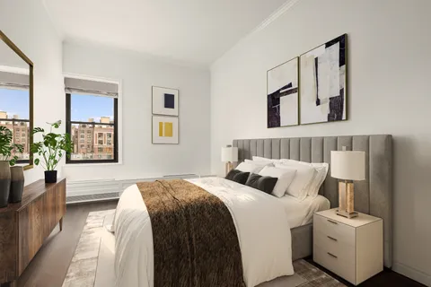 a bedroom with bed and window