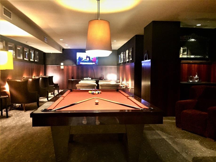 88 Greenwich Street, Unit 1212 Manhattan, NY 10006 - Photo 7 of 10 a room with table chairs and a projector