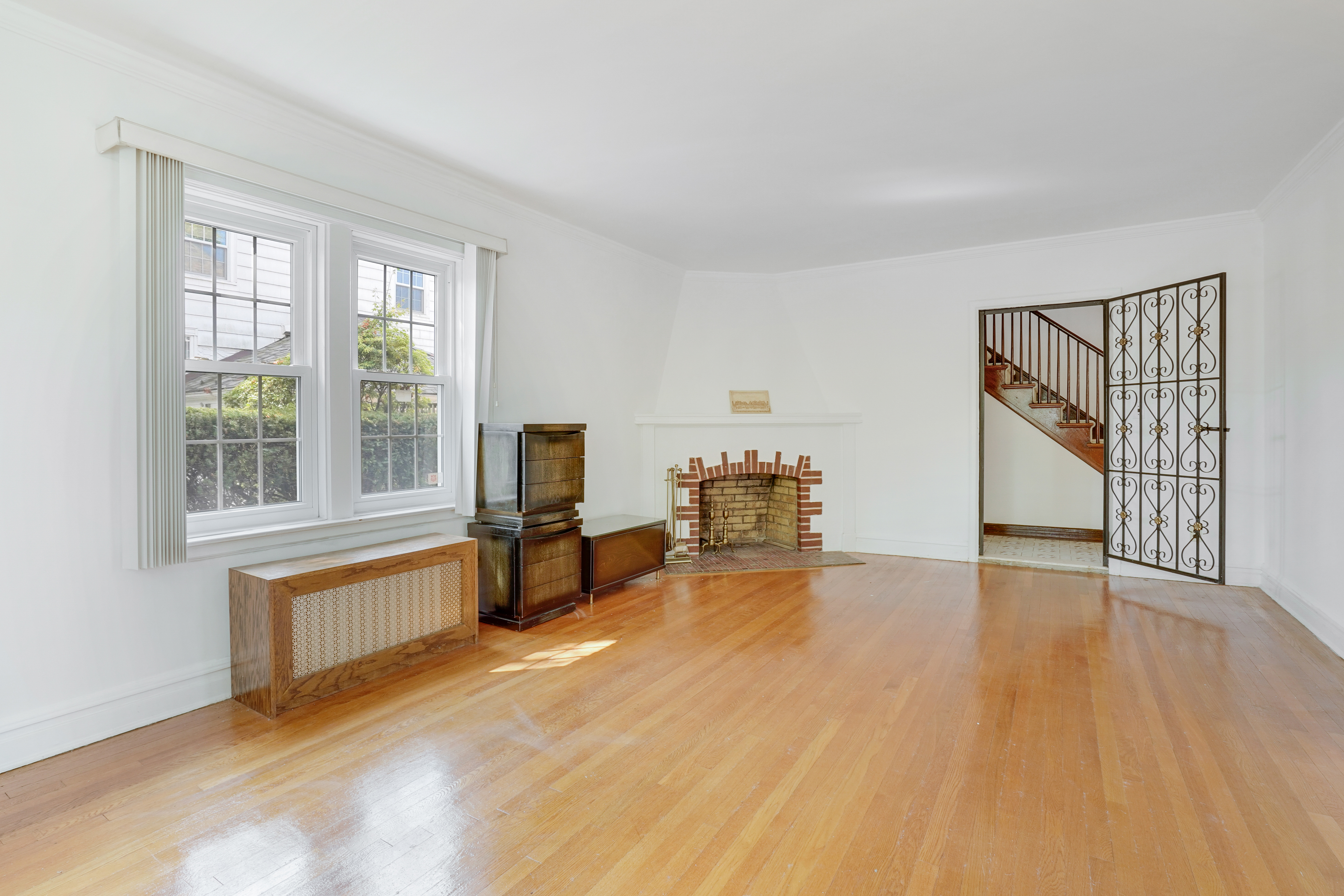 8028 Harbor View Terrace Brooklyn, NY 11209 - Photo 5 of 16 a view of an empty room with a window and a kitchen