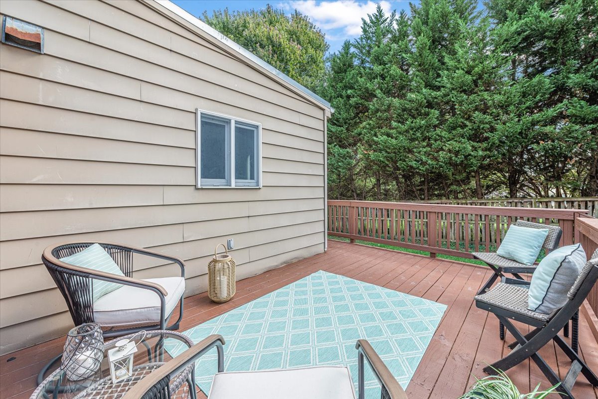 1902 Rookwood Road Silver Spring, MD 20910 - Photo 17 of 36 a view of a chair and table in the balcony