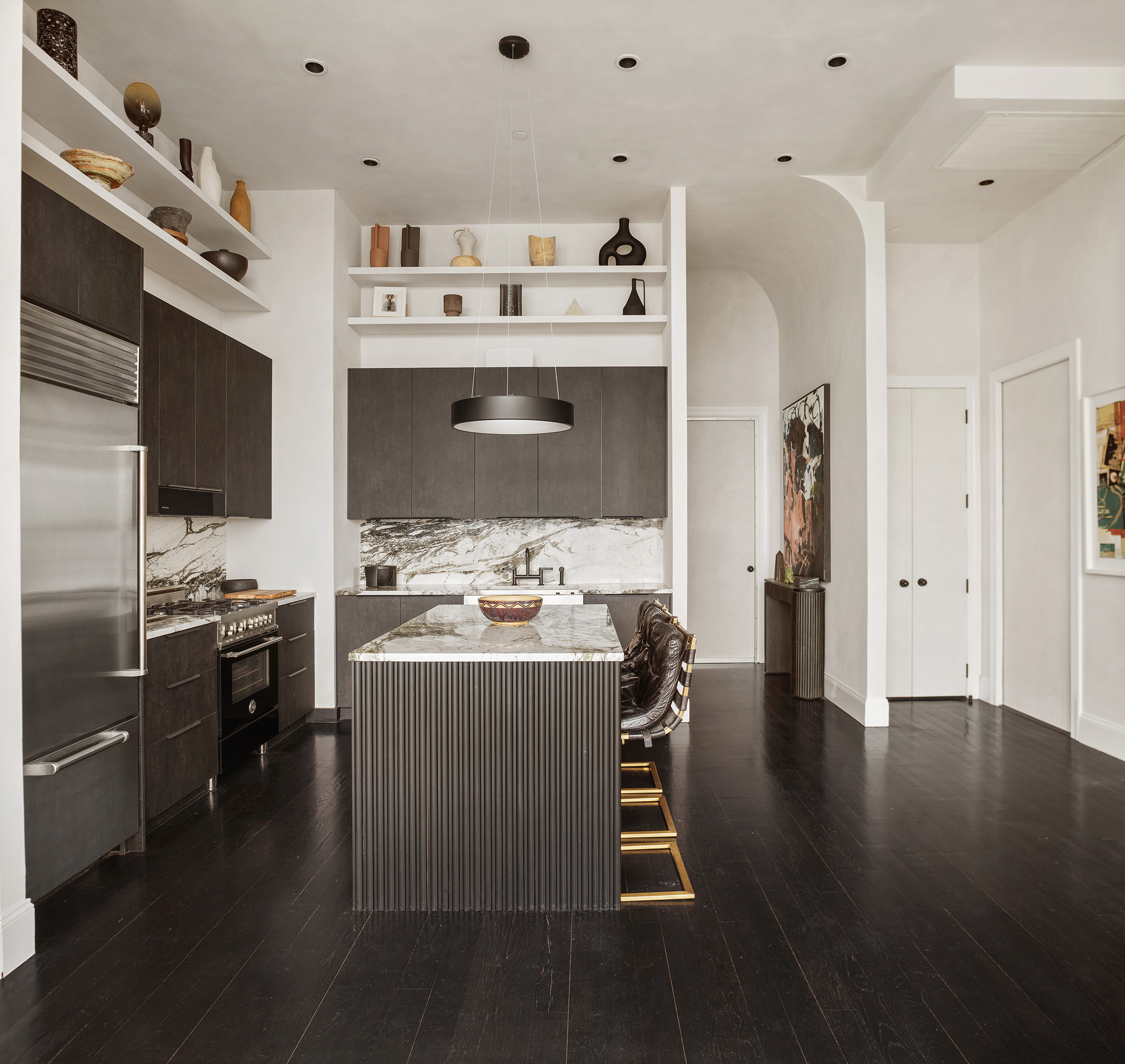 144 North 8th Street, Unit 12B Brooklyn, NY 11249 - Photo 6 of 15 a kitchen with a sink stainless steel appliances and wooden floor