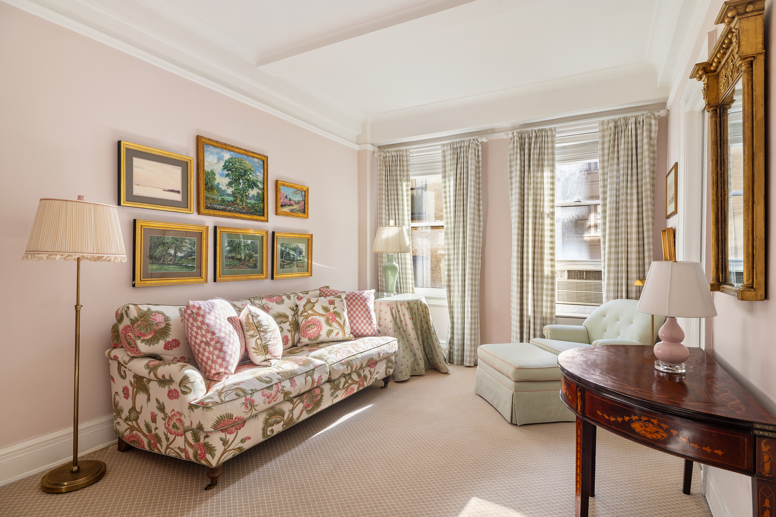 70 East 77th Street, Unit 6A Manhattan, NY 10075 - Photo 12 of 17 a living room with furniture and a large window