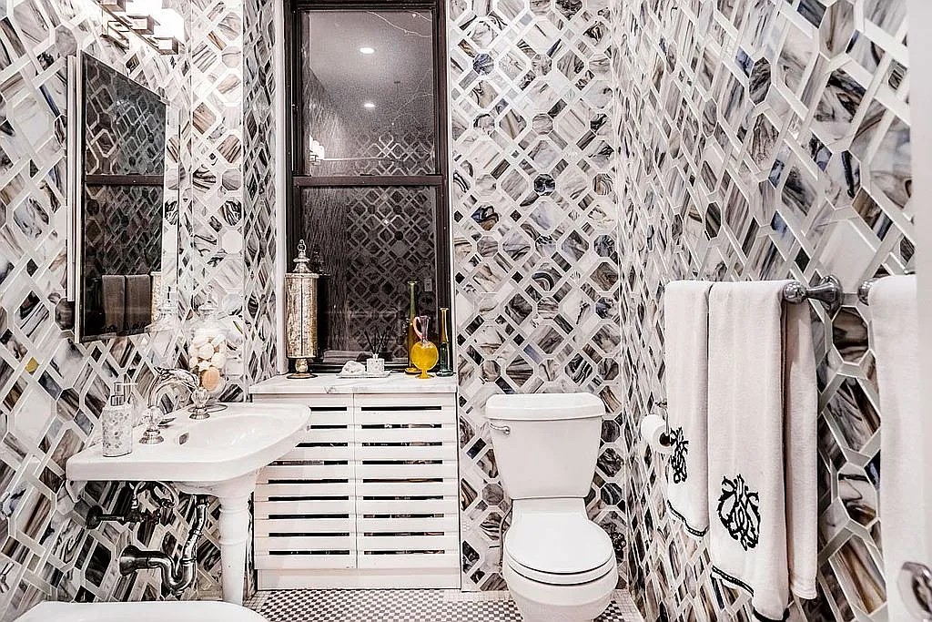 205 West 89th Street, Unit 6RS Manhattan, NY 10024 - Photo 10 of 19 a bathroom with a sink toilet and shower