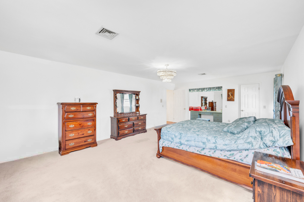 35 Poe Street Staten Island, NY 10307 - Photo 22 of 36 a living room with furniture and dresser