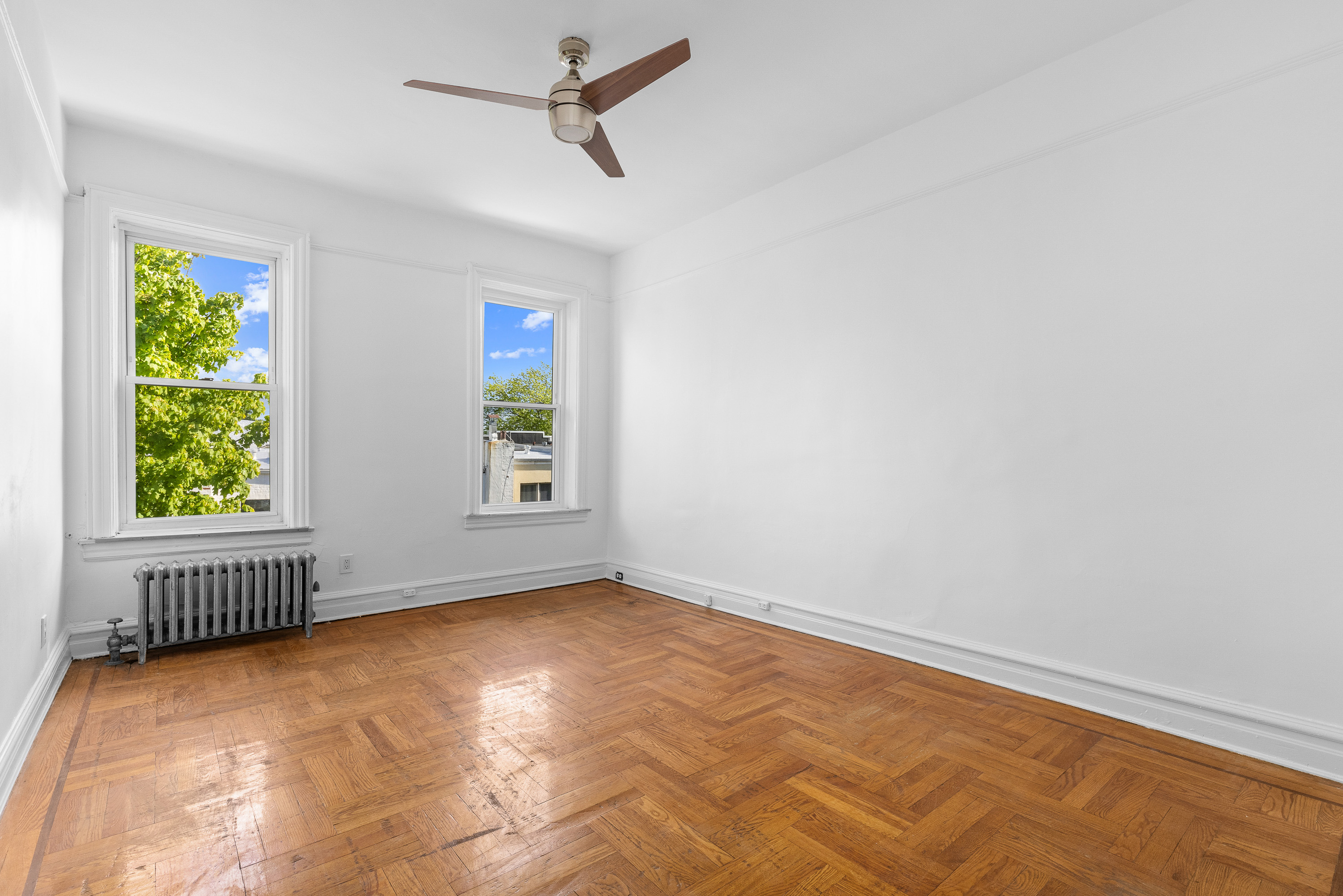 124 Terrace Place, Unit 2 Brooklyn, NY 11218 - Photo 4 of 8 a view of an empty room with a window