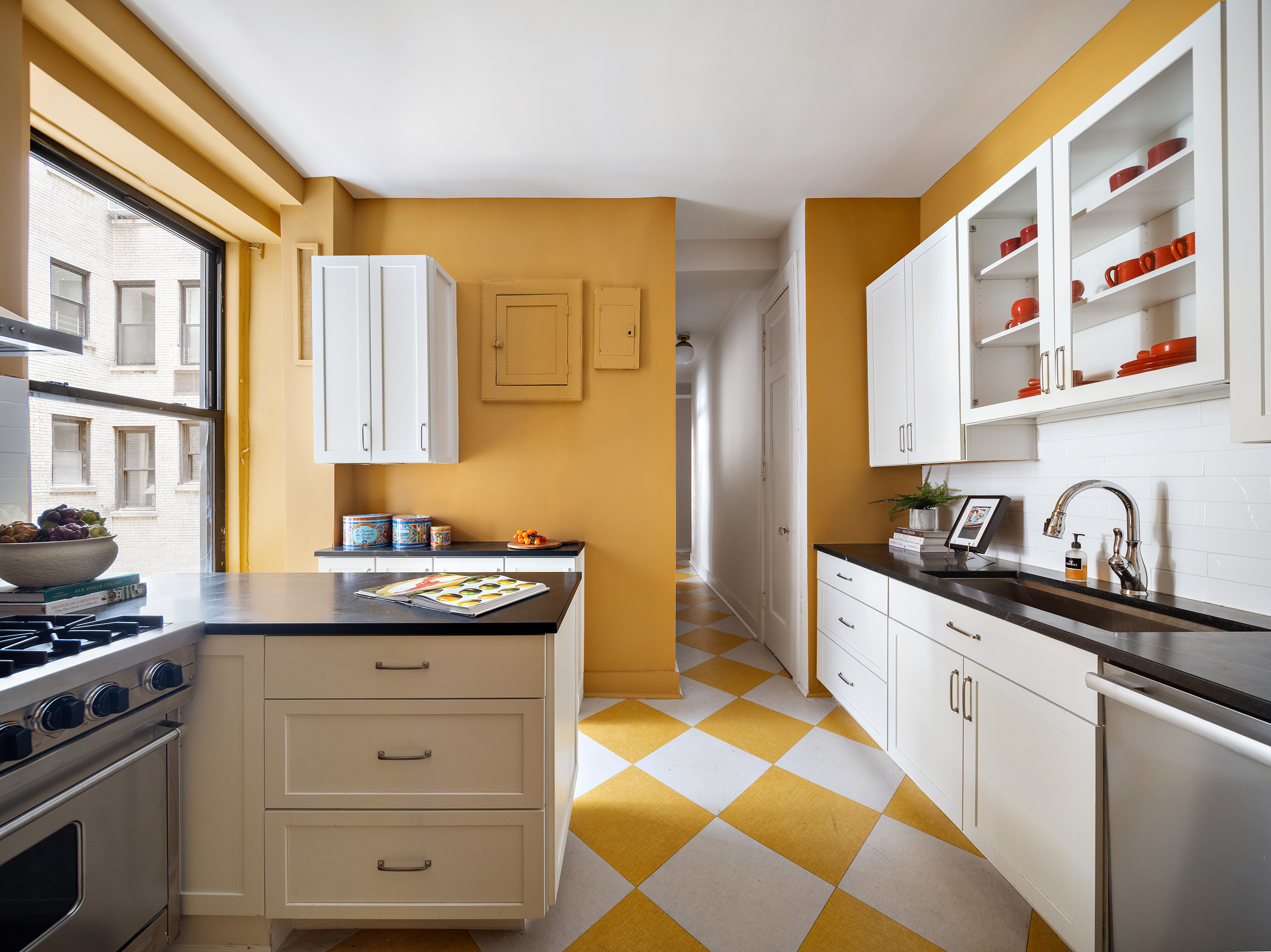 270 Riverside Drive, Unit 2C Manhattan, NY 10025 - Photo 15 of 22 a kitchen with stainless steel appliances a stove a sink and a cabinets