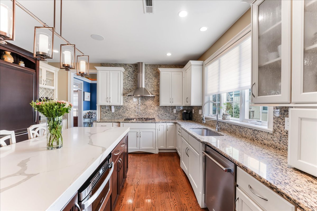 248 Valley Ridge Road Haverford, PA 19041 - Photo 13 of 44 a kitchen with a sink a counter top space appliances and cabinets