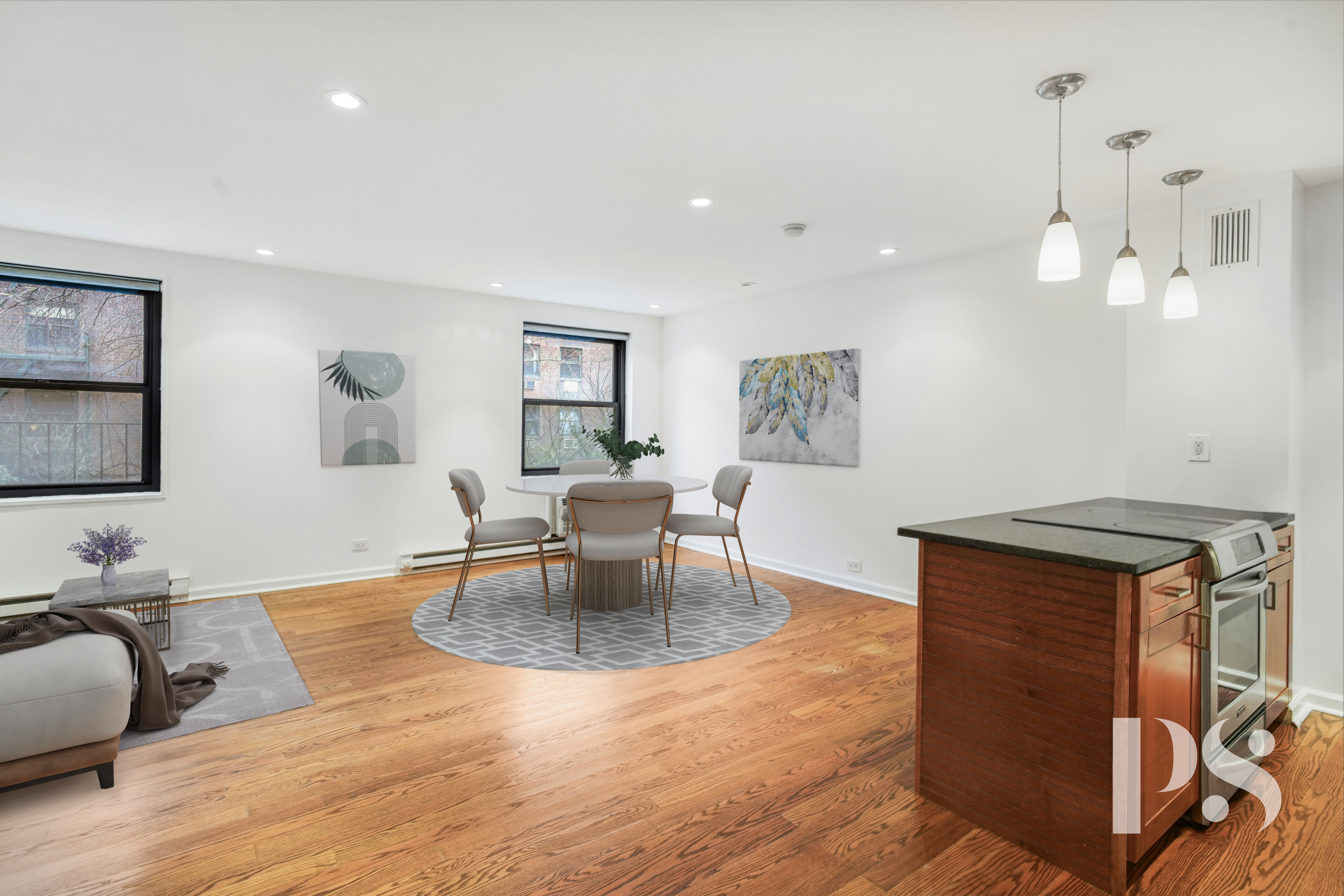 133 Barrow Street, Unit 1B Manhattan, NY 10014 - Photo 2 of 11 a living room with furniture and a wooden floor