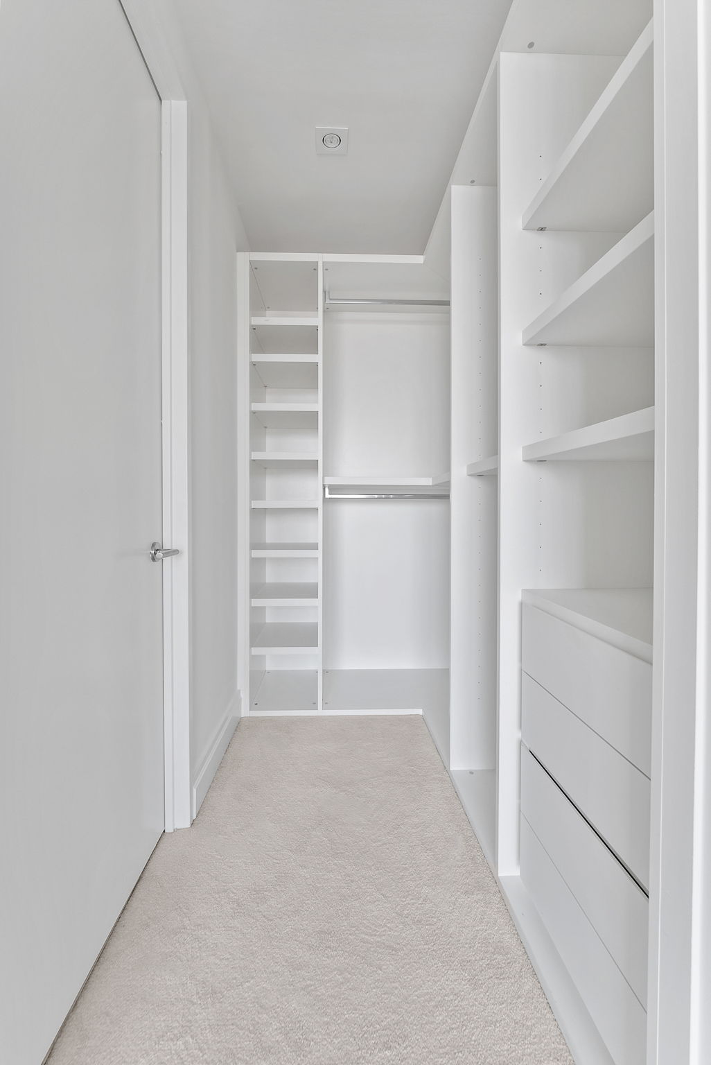 845 United Nations Plaza, Unit 63D Manhattan, NY 10017 - Photo 6 of 16 a view of an empty walk in closet