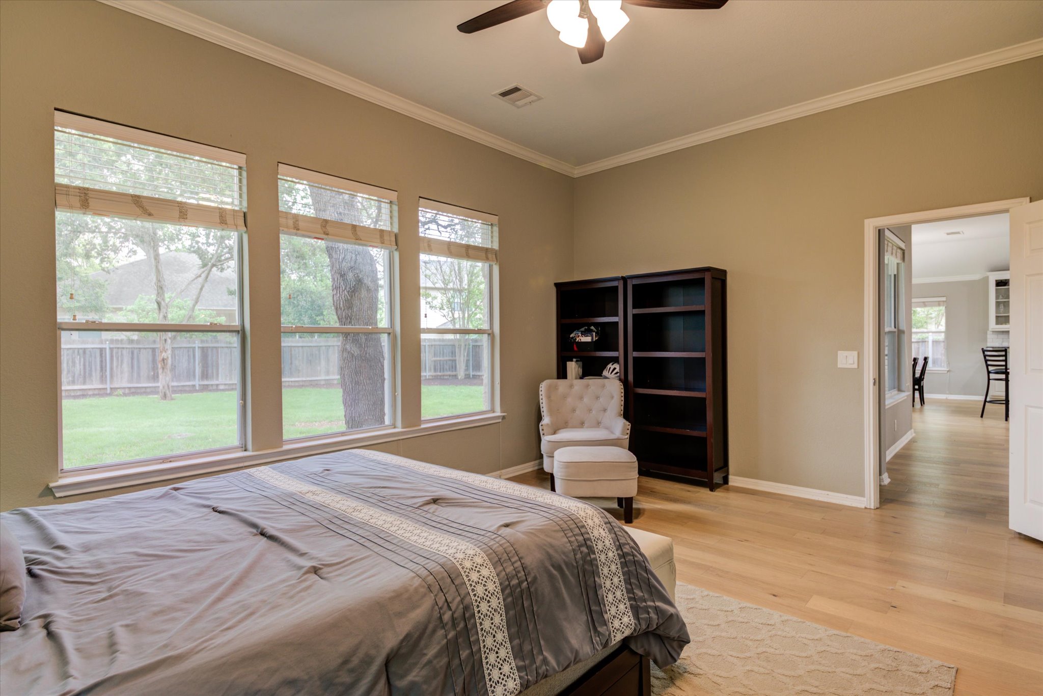 5412 Batak Lane Austin, TX 78749 - Photo 27 of 40 a bedroom with a large bed and a large window