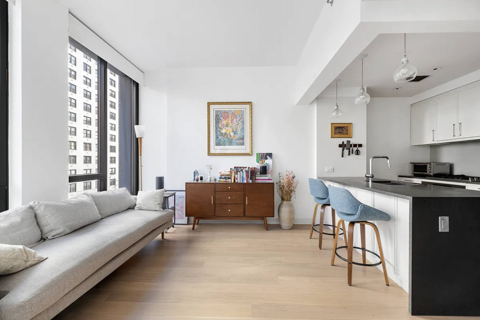 a living room with furniture and a window