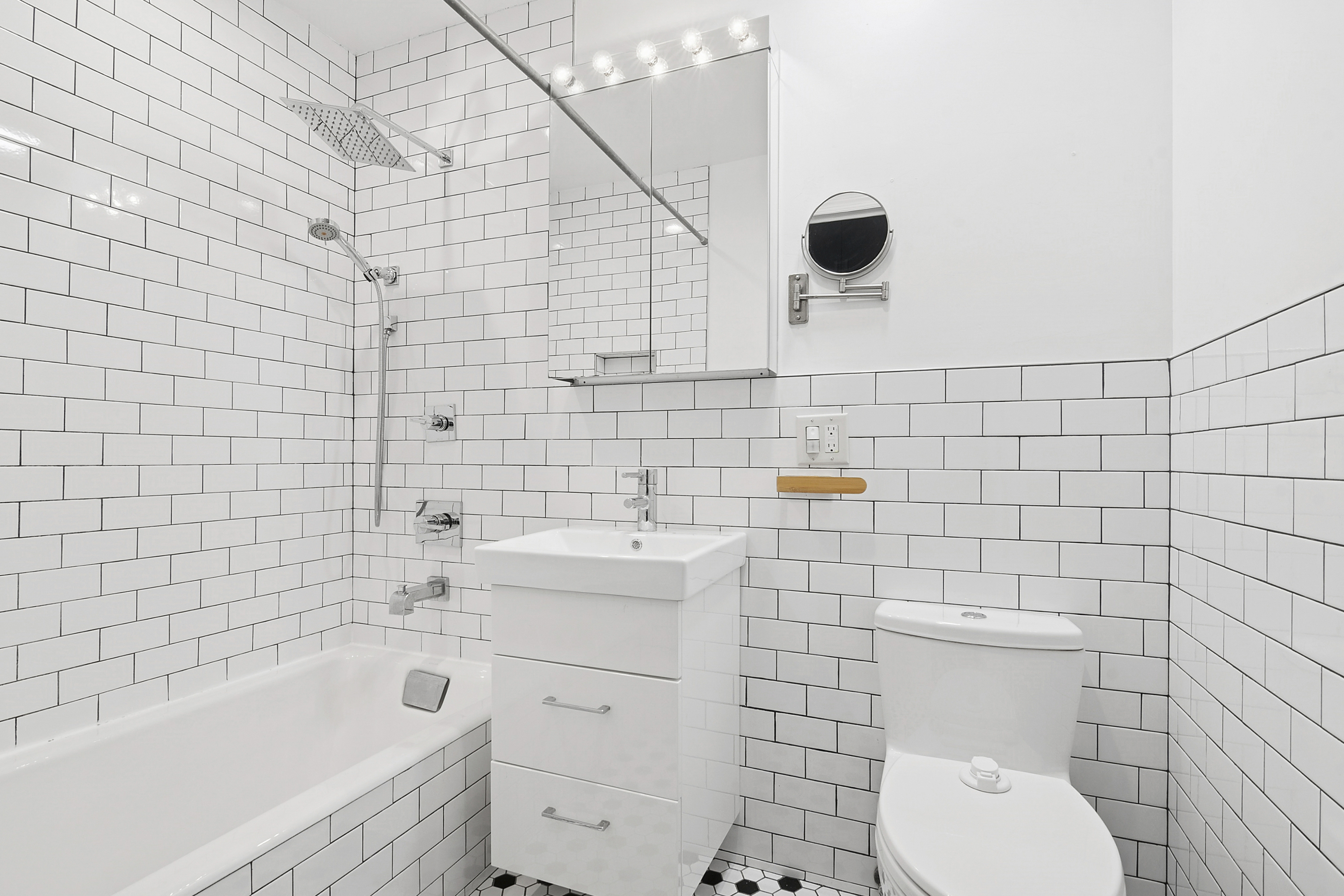 594 6th Avenue, Unit 1 Brooklyn, NY 11215 - Photo 6 of 13 a bathroom with a toilet and a sink
