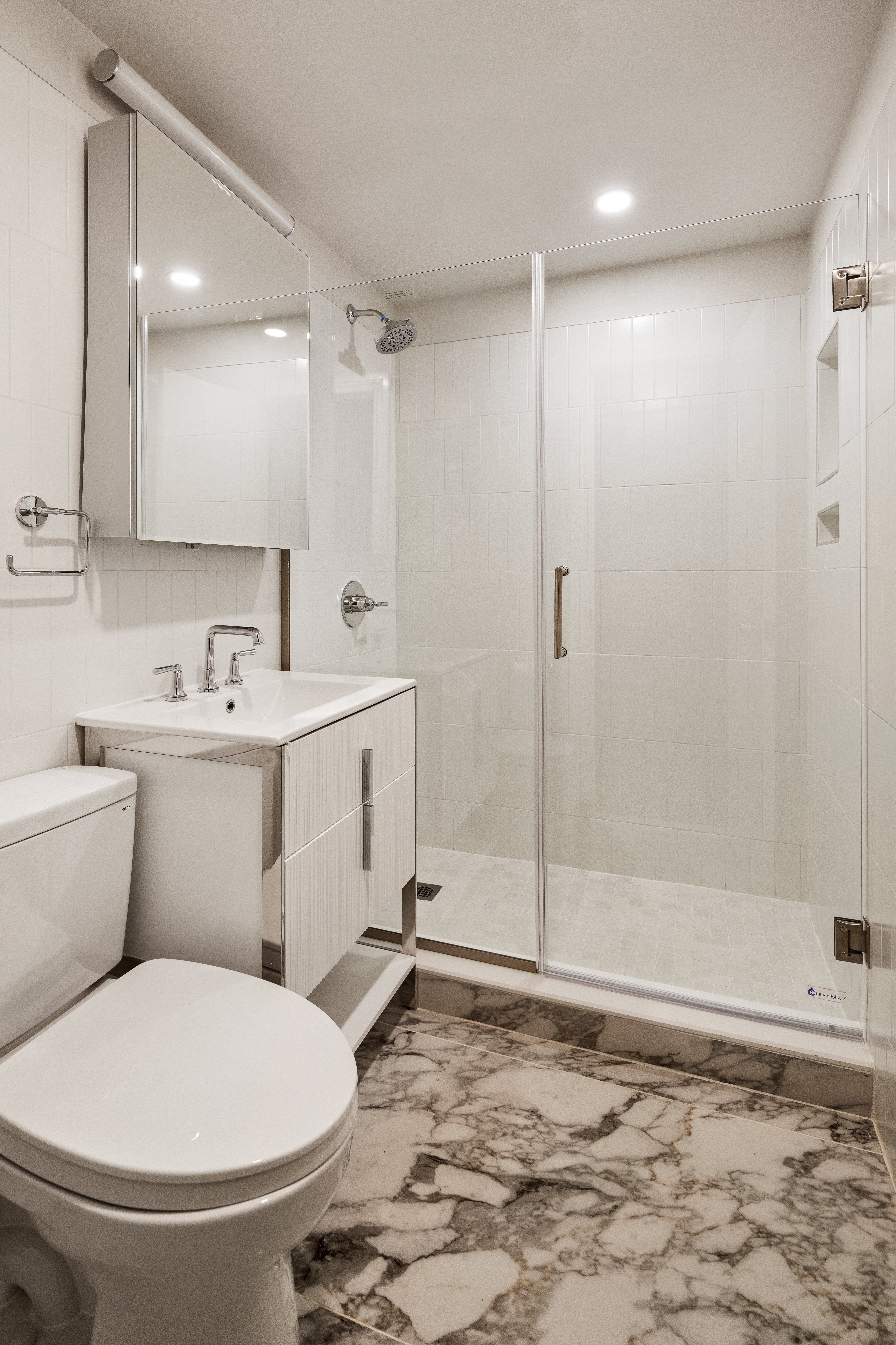 544 Court Street, Unit 2 Brooklyn, NY 11231 - Photo 6 of 9 a bathroom with a sink a toilet and shower