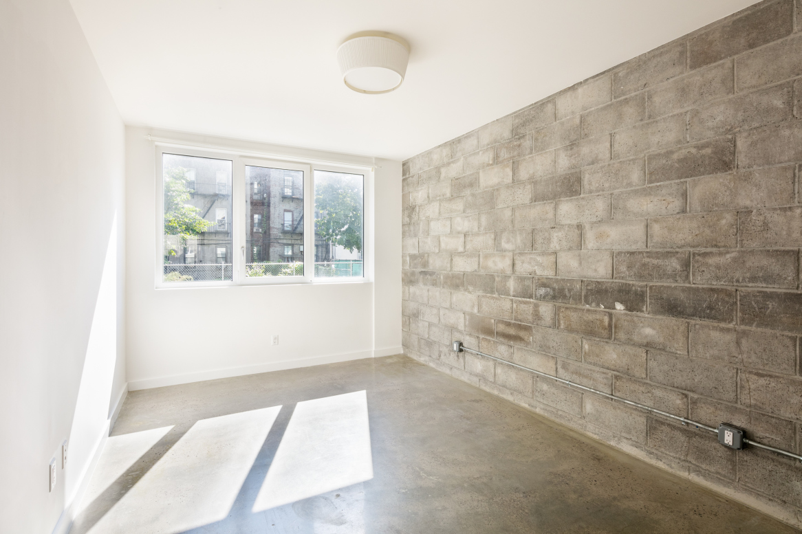 834 Sterling Place, Unit 203 Brooklyn, NY 11216 - Photo 4 of 12 an empty room with a window