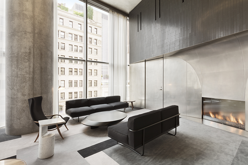 56 Leonard Street, Unit 14BEAST Manhattan, NY 10013 - Photo 23 of 35 a living room with furniture and a fireplace