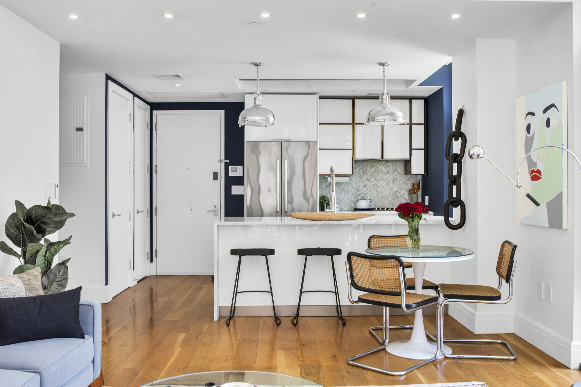 47 Bridge Street, Unit 3DD Brooklyn, NY 11201 - Photo 3 of 24 a dining room with furniture and wooden floor
