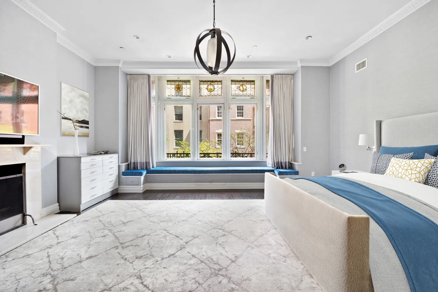 a bathroom with a double vanity sink a mirror and a bathtub