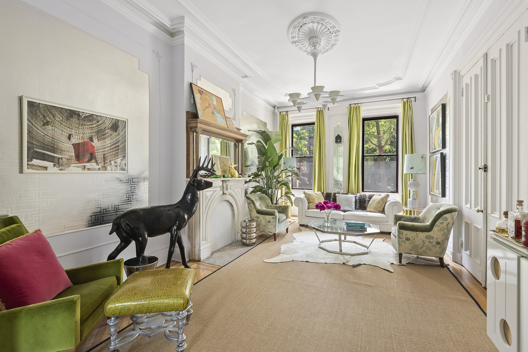 399 Union Street, Unit 1 Brooklyn, NY 11231 - Photo 1 of 10 a living room with furniture and a chandelier