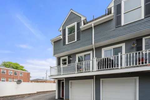 a front view of a house with balcony