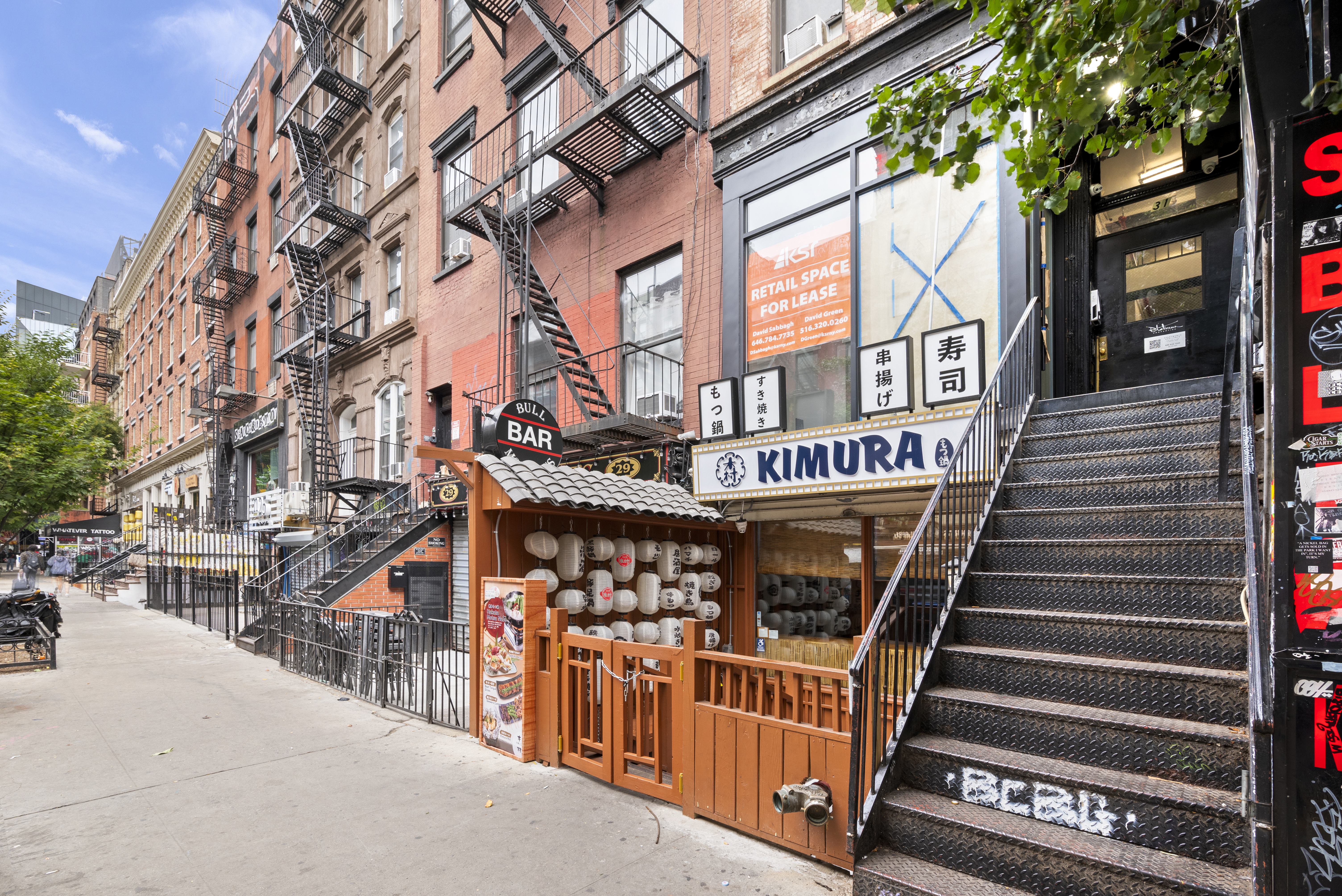 31 St Marks Place, Unit 4 Manhattan, NY 10003 - Photo 10 of 11 a front view of a building with glass windows and door
