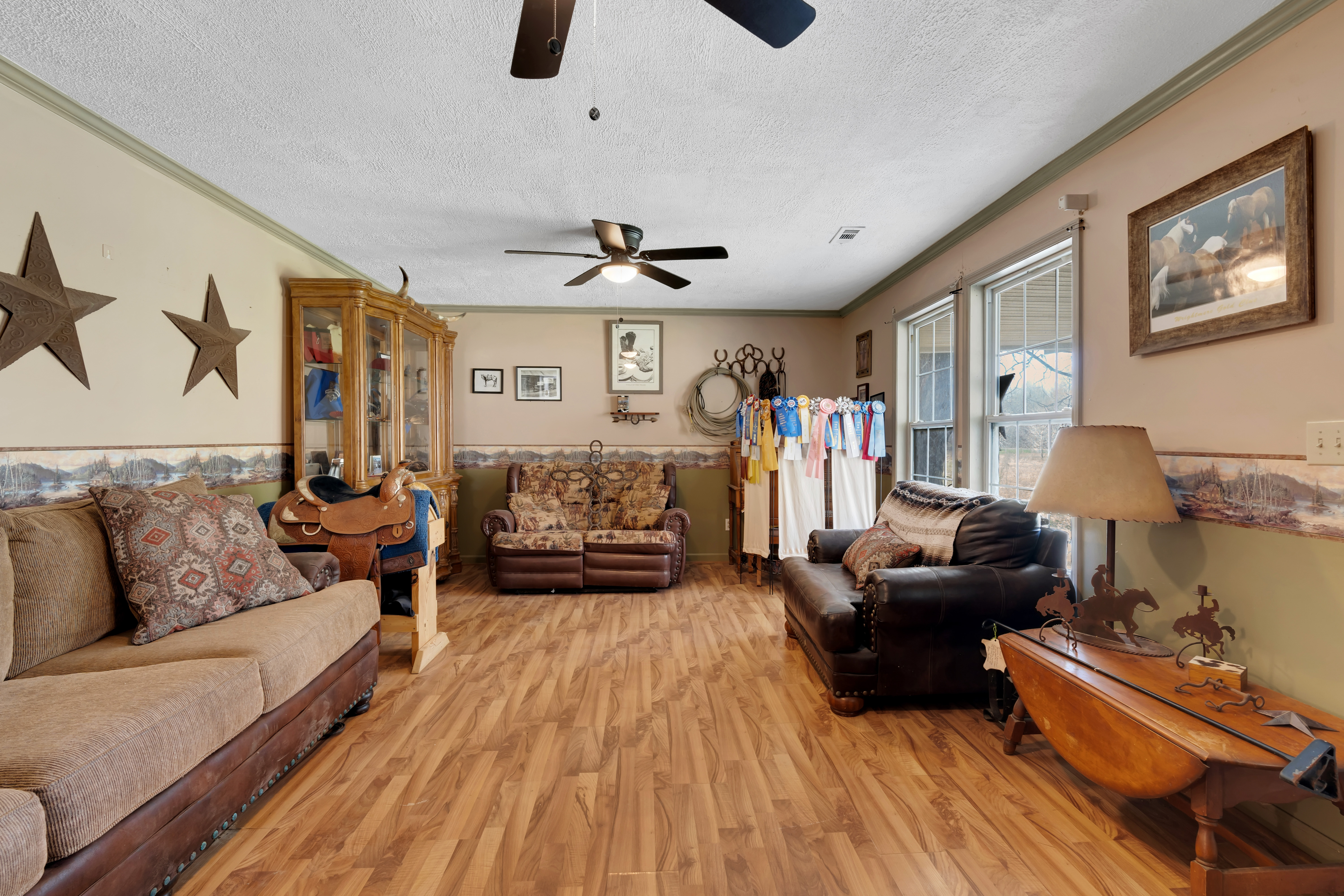 2073 Harpo Road Manchester, TN 37355 - Photo 29 of 45 a living room with furniture and a wooden floor