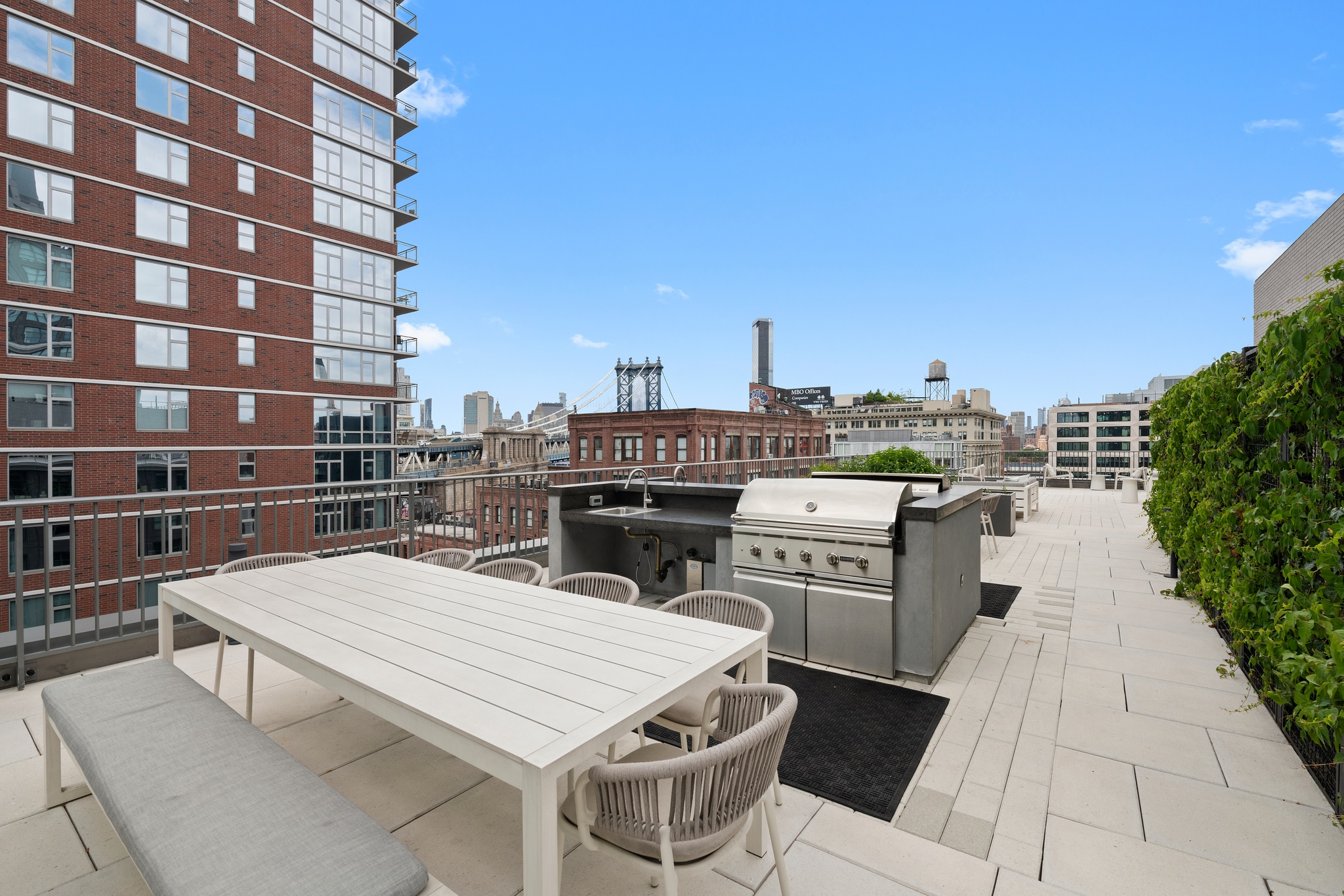 160 Front Street, Unit 517 Brooklyn, NY 11201 - Photo 7 of 14 a dinning table and chairs in the terrace